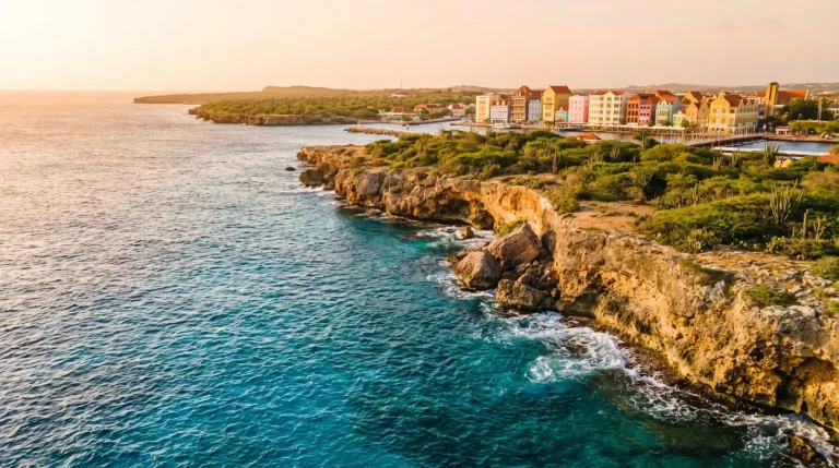 Curaçao licensed casinos UK — Caribbean island coastline representing offshore gaming jurisdiction